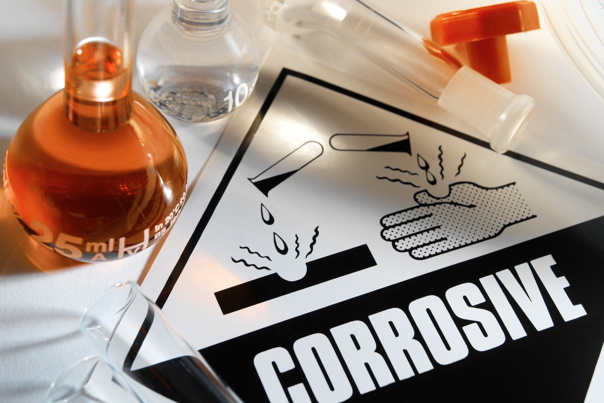 Corrosive Warning Sign - A corrosive substance is one that will damage or destroy other substances