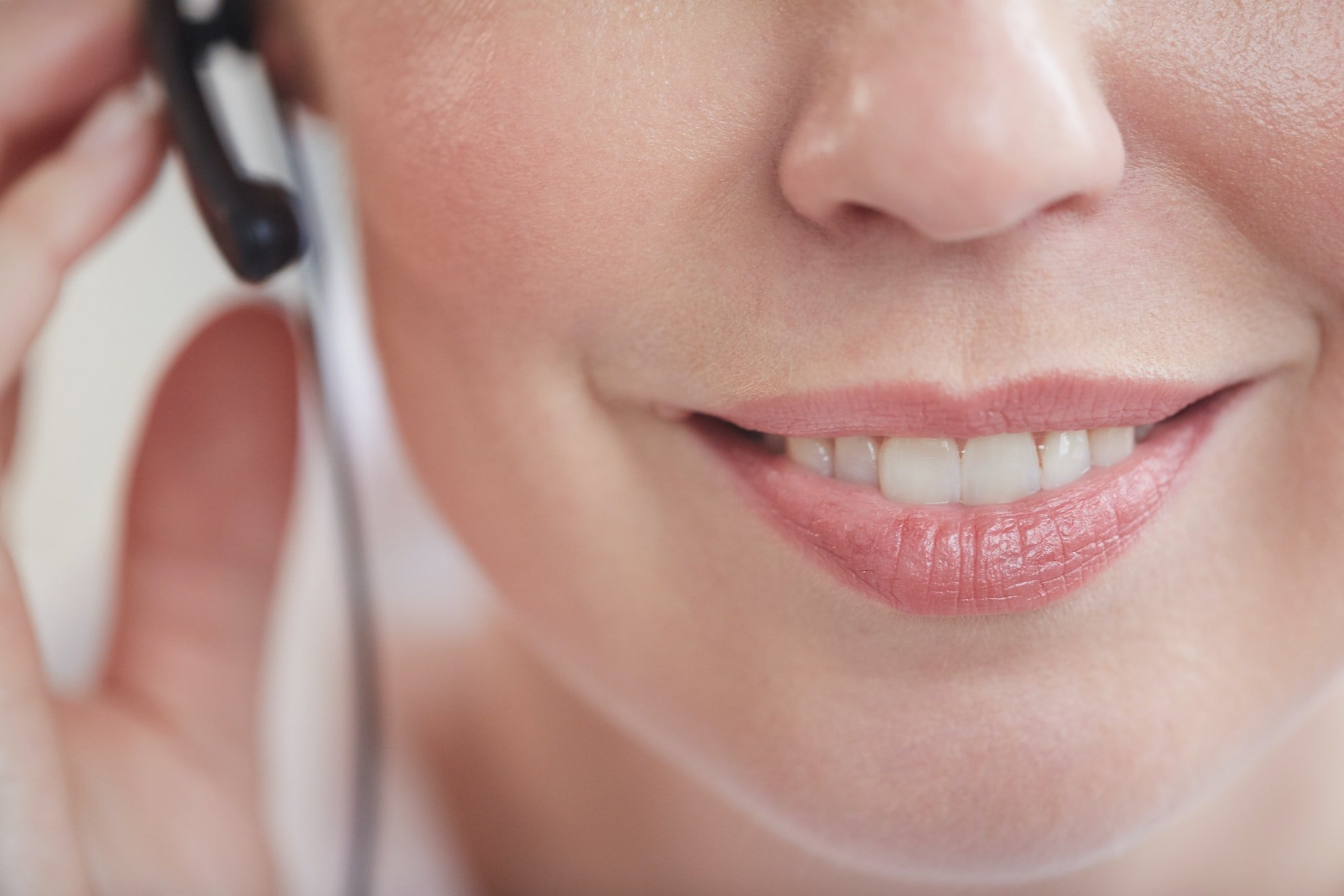 Smiling Call Center Operator Close up