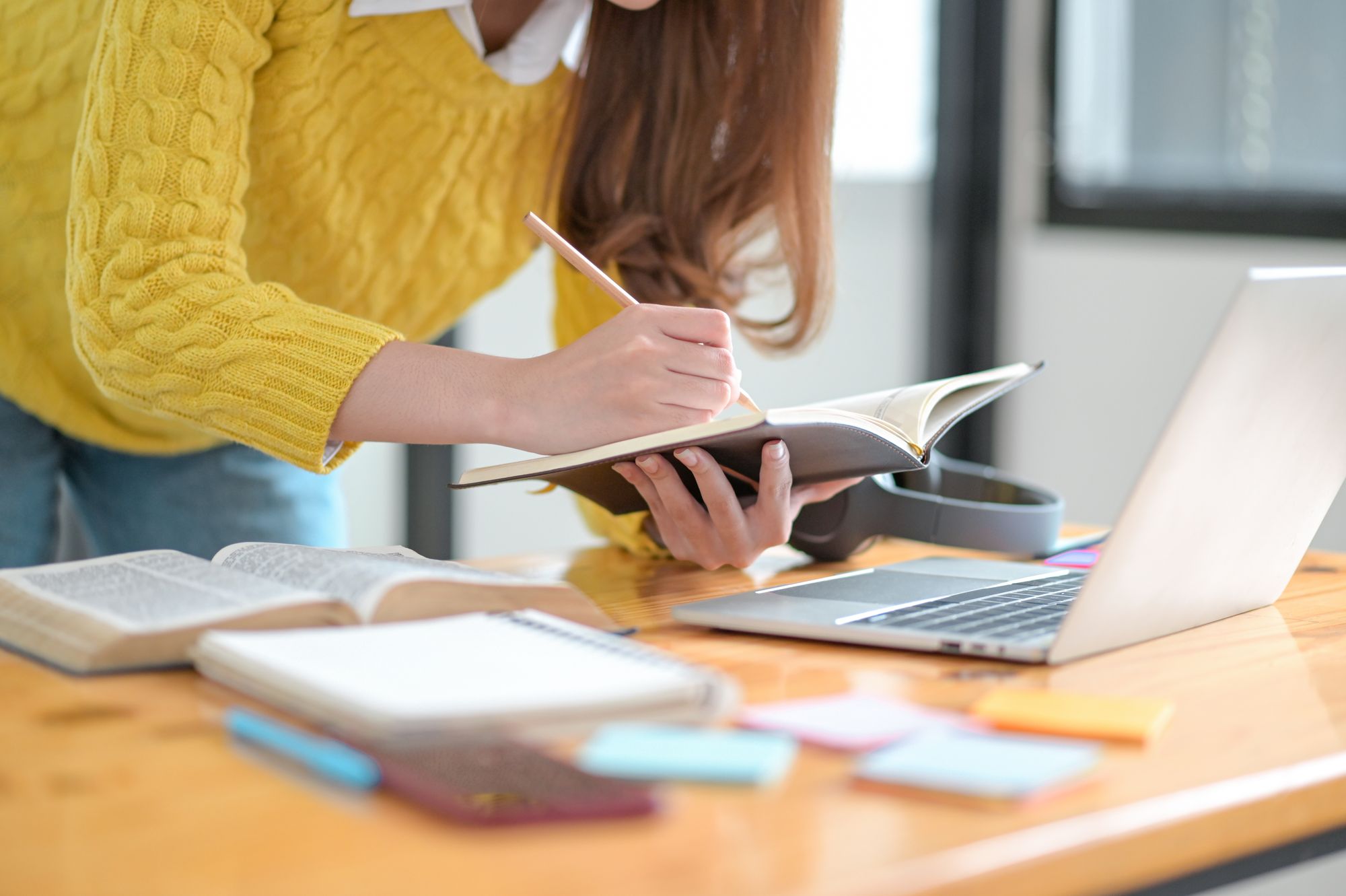 Students use laptops and take notes for university entrance exam Training for managers